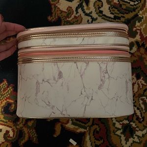 Pink and white travel makeup bag